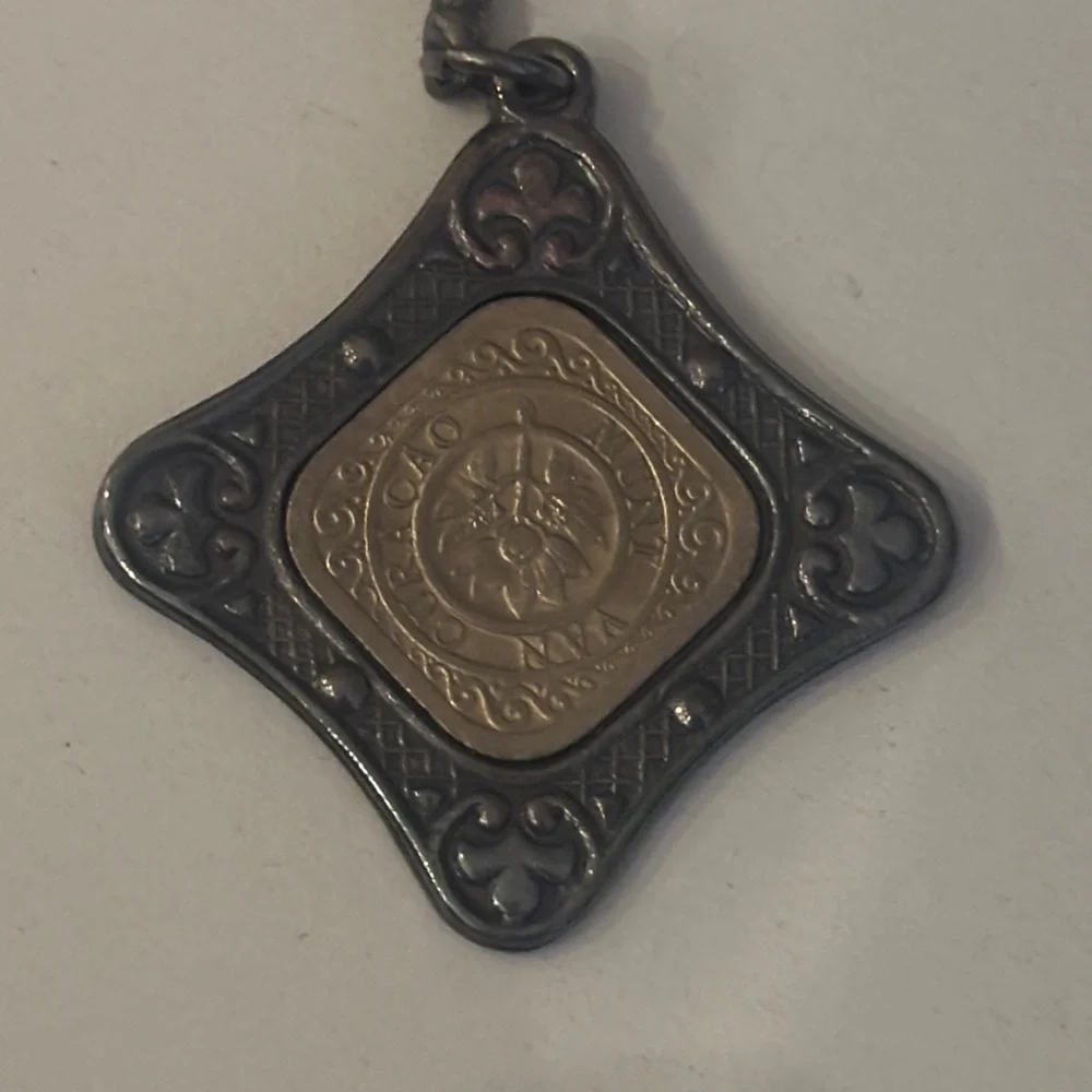 Key Chain featuring a 1943 Curaçao 5 cents coin set in a metal holder